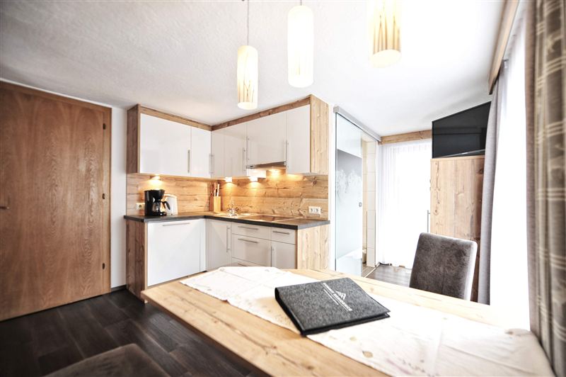Appartement der Hirsch - Wohnbereich mit Außenlounge